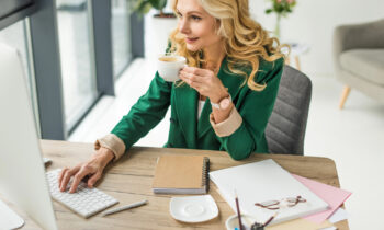 A woman on her computer looking for work at home jobs for math lovers