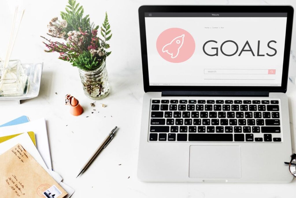 A laptop with the word, "Goals" written on it.