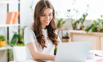Woman working on laptop trying to figure out how to get started working from home